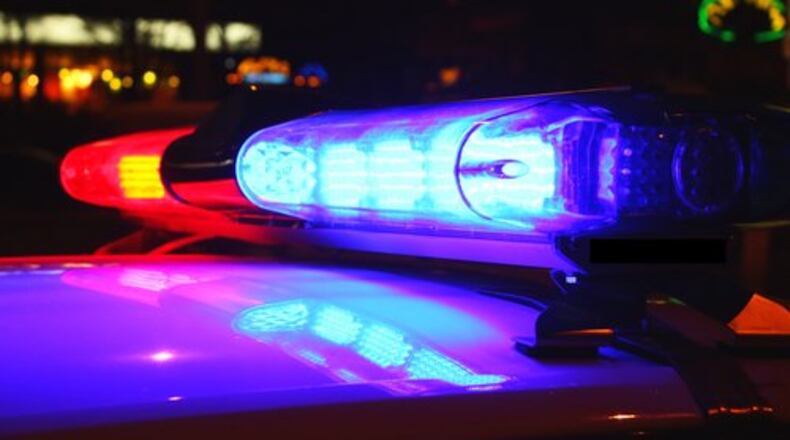 A wife has sued her ex-husband after he allegedly had her arrested over a Facebook post.