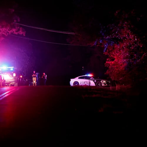 Police block off near S. Air Depot boulevard in Edmond, Okla., after a campground shooting at Lake Arcadia, Saturday, May 3, 2026. (AP Photo/Alonzo Adams)
