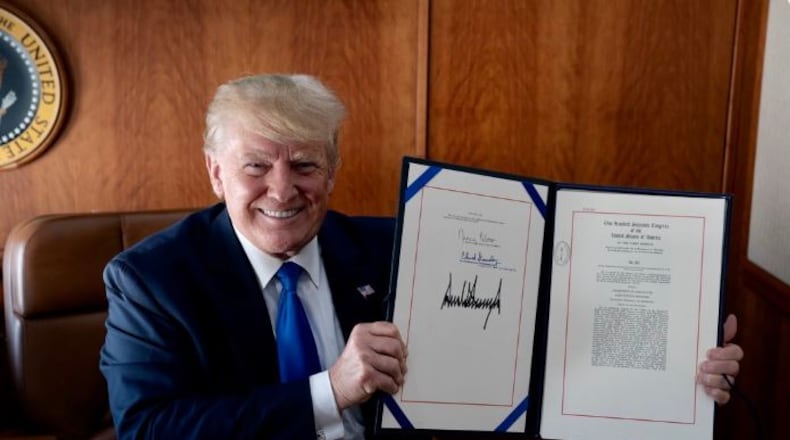 President Donald Trump tweeted out this picture of a $19.1 billion disaster relief bill he signed into law on Thursday.