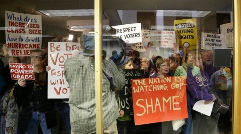 Protesters rally at North Carolina statehouse. AP/Gerry Broome.