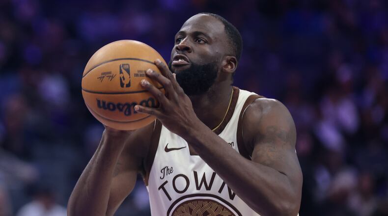 FILE - Golden State Warriors forward Draymond Green (23) shoots a free throw during the second half of an NBA basketball game against the Sacramento Kings on April 10, 2026, in Sacramento, Calif. (AP Photo/Scott Marshall, File)