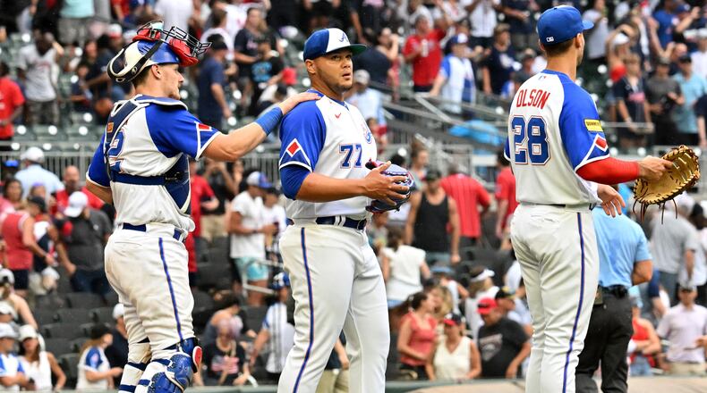 Braves catcher Sean Murphy (left) congratulates Atlanta Braves' relief pitcher Joe Jimenez (77) after Atlanta Braves won 7-0 over Miami Marlins at Truist Park, Saturday, July 1, 2023, in Atlanta. Atlanta Braves  (Hyosub Shin / Hyosub.Shin@ajc.com)