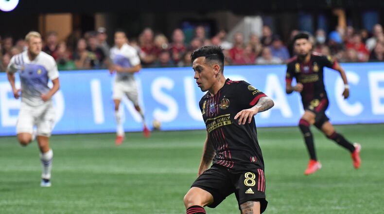 September 10, 2021 Atlanta - Atlanta United's midfielder Ezequiel Barco (8) works the ball before making a shot on goal during the second half in a MLS soccer match at Mercedes-Benz Stadium in Atlanta on Friday, September 10, 2021. Atlanta United won 3-0 over Orlando City. (Hyosub Shin / Hyosub.Shin@ajc.com)