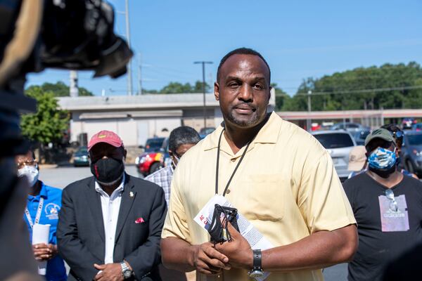 Mitchell Taylor, the vice president of the Atlanta Metro Area Local APW union, speaks about the current morale of U.S. Postal Service clerks during a press conference Tuesday. (ALYSSA POINTER / ALYSSA.POINTER@AJC.COM)
