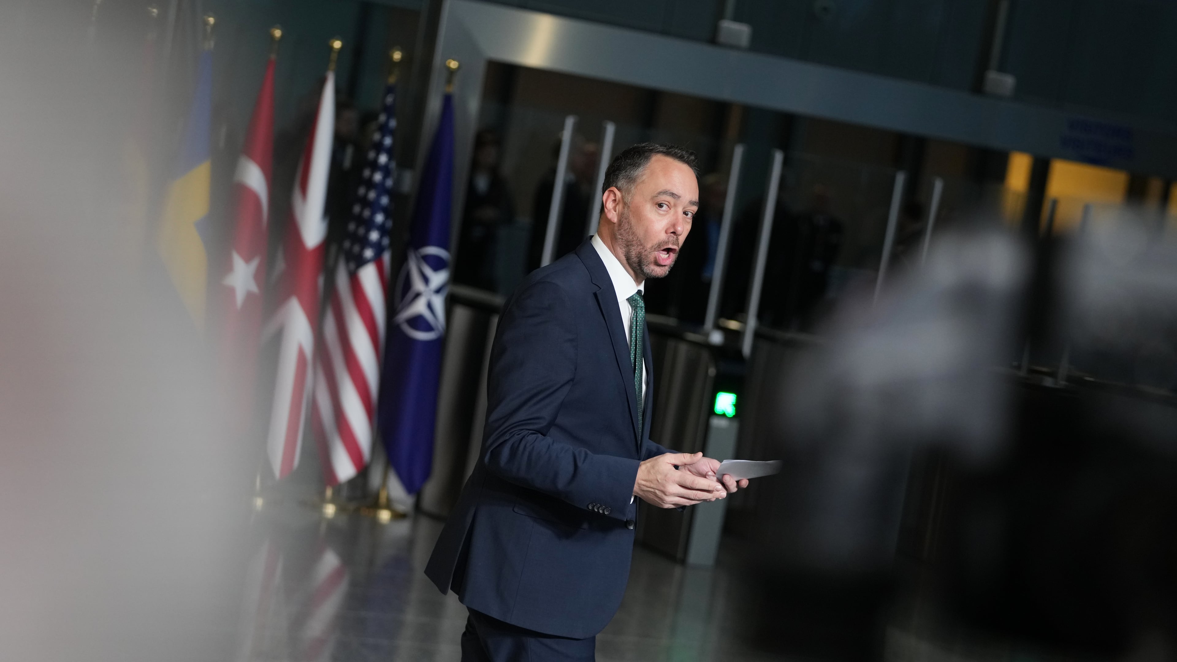Belgium's Foreign Minister Maxime Prevot speaks with journalists as he arrives for a meeting of NATO foreign ministers at NATO headquarters in Brussels, Wednesday, Dec. 3, 2025. (AP Photo/Virginia Mayo)