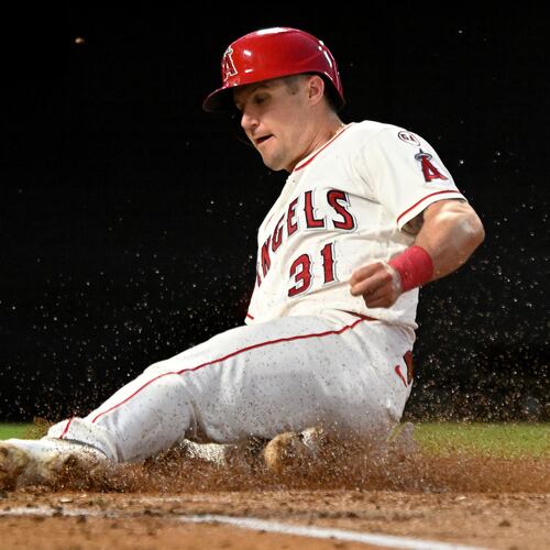 Los Angeles Angels' Tyler Heineman (31) scores a run against the New York Yankees in the third inning of a baseball game Monday, Aug. 31, 2026, in Anaheim, Calif. (AP Photo/Wally Skalij)