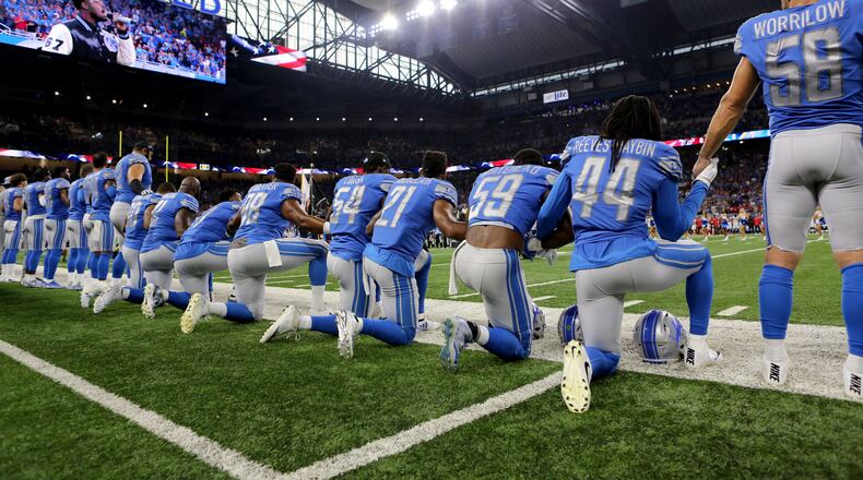 Members of  the Detroit Lions take a knee during the playing of the national anthem prior to the start of the game against the Atlanta Falcons at Ford Field on September 24, 2017 in Detroit, Michigan. (Photo by Rey Del Rio/Getty Images)