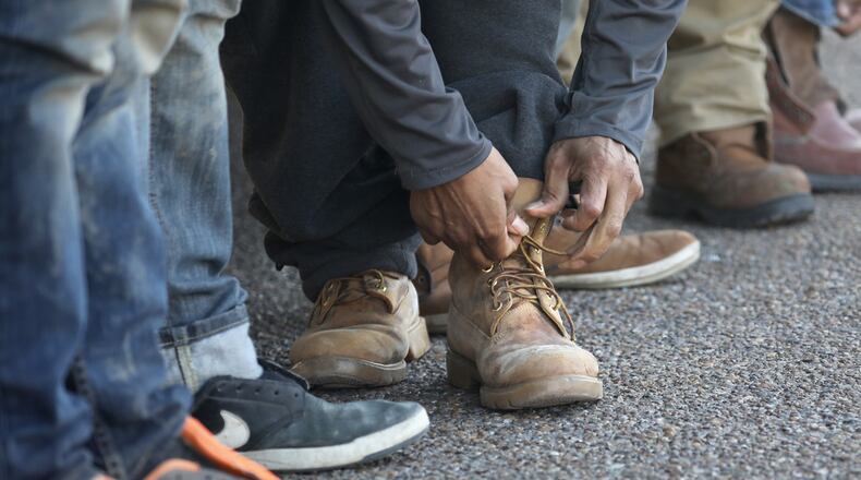File photo of someone tying a shoe