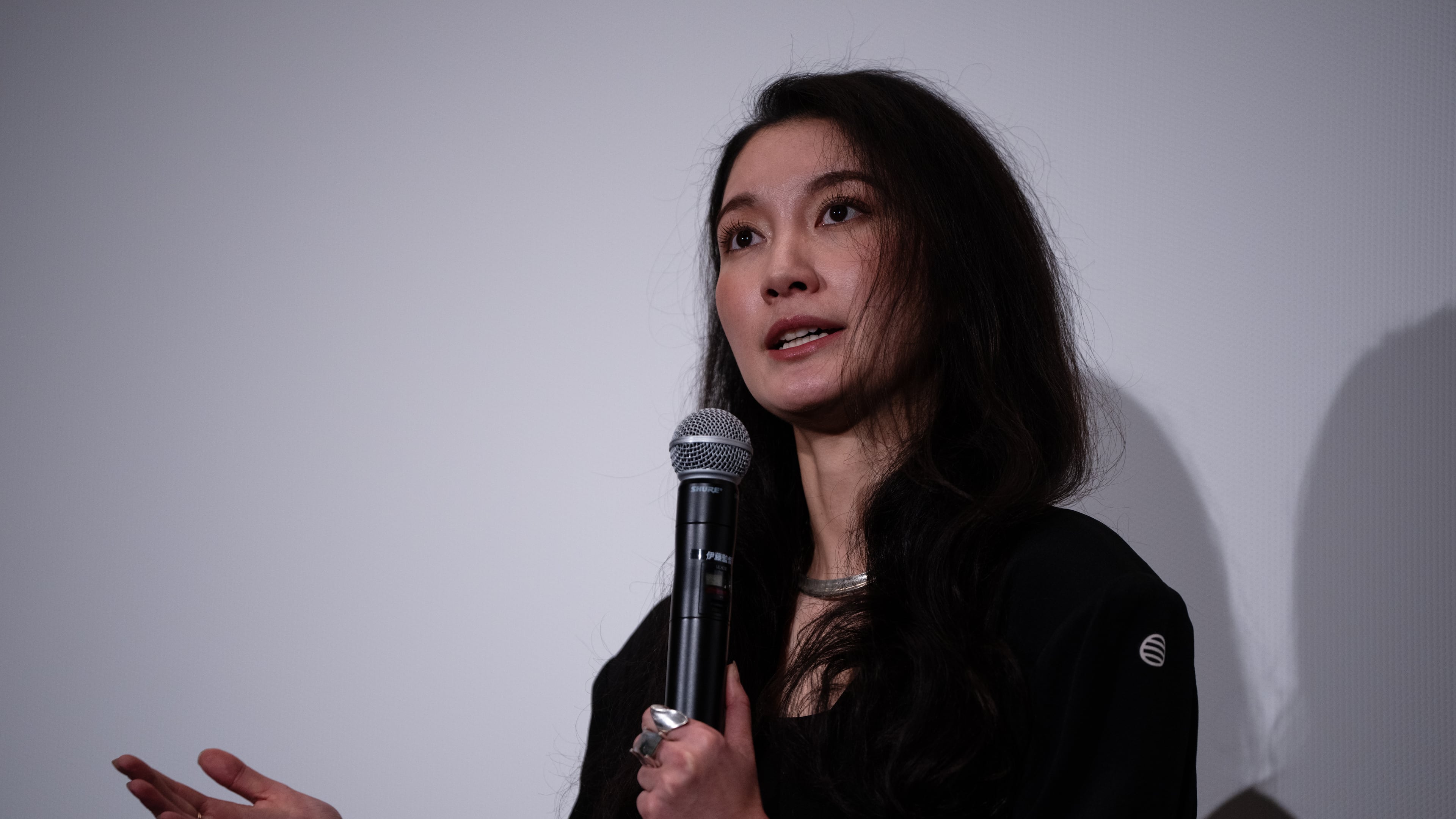 Director Shiori Itō speaks after the Japan premiere of "Black Box Diaries" at a cinema in Tokyo, Friday, Dec. 12, 2025. (AP Photo/Louise Delmotte)