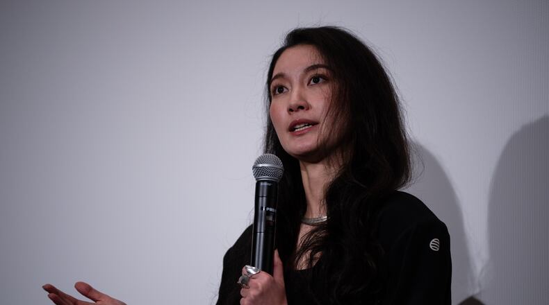 Director Shiori Itō speaks after the Japan premiere of "Black Box Diaries" at a cinema in Tokyo, Friday, Dec. 12, 2025. (AP Photo/Louise Delmotte)