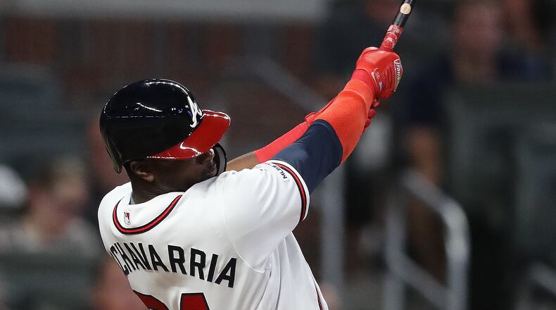 Atlanta Braves Adeiny Hechavarria hits a solo home run against the Philadelphia Phillies to cut the lead to 5-3 during the 8th inning in a MLB baseball game on Tuesday, Sept. 17, 2019, in Atlanta.  Curtis Compton/ccompton@ajc.com