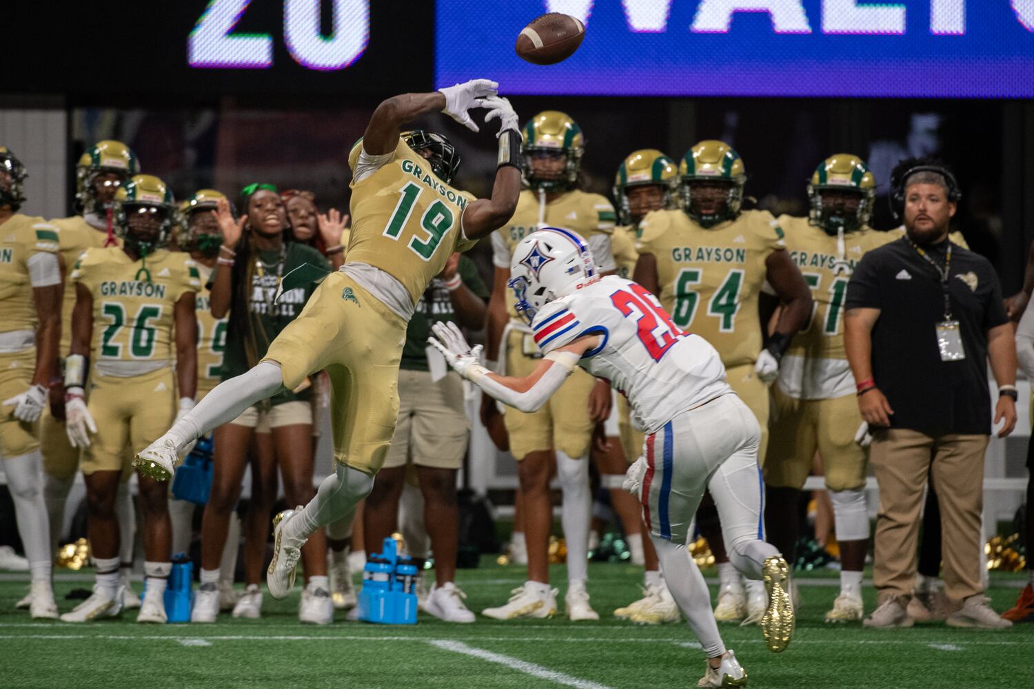 Ethan Stannard, defensive back for Walton, breaks up a pass to Grayson's wide reciever John Cineas. (Jamie Spaar for the Atlanta Journal Constitution)