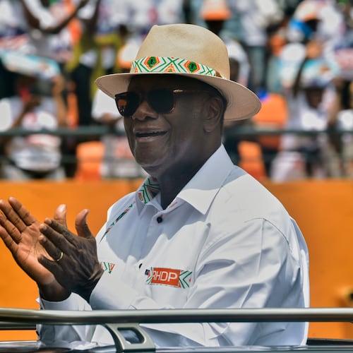 President Alassane Ouattara arrives at a campaign rally at the Félix Houphouët-Boigny Stadium in Abidjan, Ivory Coast, Saturday, Oct. 18, 2025. (AP Photo/Diomande Ble Blonde)