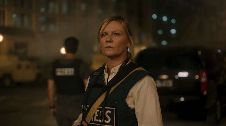 Kirsten Dunst is a war photographer in the hotly anticipated dystopian drama "Civil War."
(Courtesy of A24)