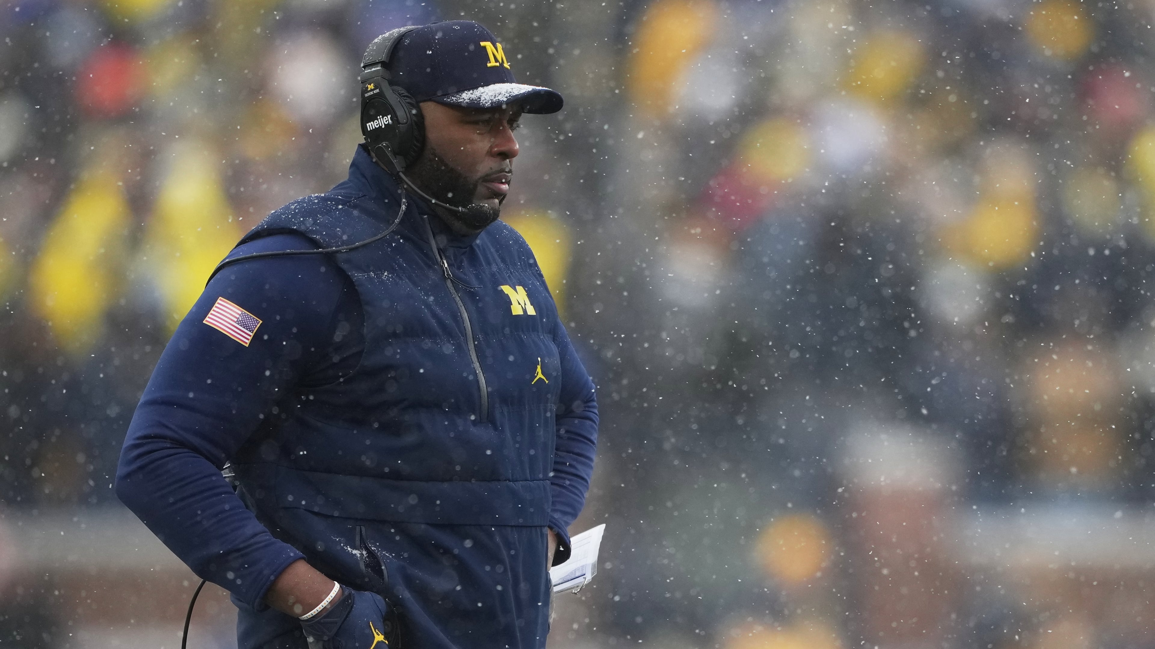 Michigan head coach Sherrone Moore watches from the sideline during the second half of an NCAA college football game against Ohio State, Saturday, Nov. 29, 2025, in Ann Arbor, Mich. (AP Photo/Ryan Sun)