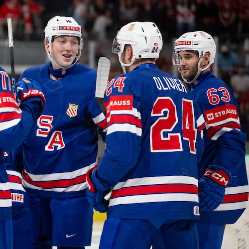 USA's players celebrate their side's third goal during the 2026 IIHF Men's Ice Hockey World Championship preliminary round group A match between United States and Austria in Zurich, Switzerland, Tuesday, May 26, 2026. (Andreas Becker/Keystone via AP)