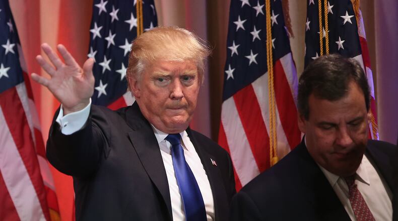 Republican Presidential frontrunner Donald Trump leaves the stage after speaking to the media the Mar-A-Lago Club on March 1, 2016 in Palm Beach, Florida. Trump held the press conference, flanked by New Jersey Governor Chris Christie, on Super Tuesday after the closing of polls in a dozen states nationwide. (Photo by John Moore/Getty Images)