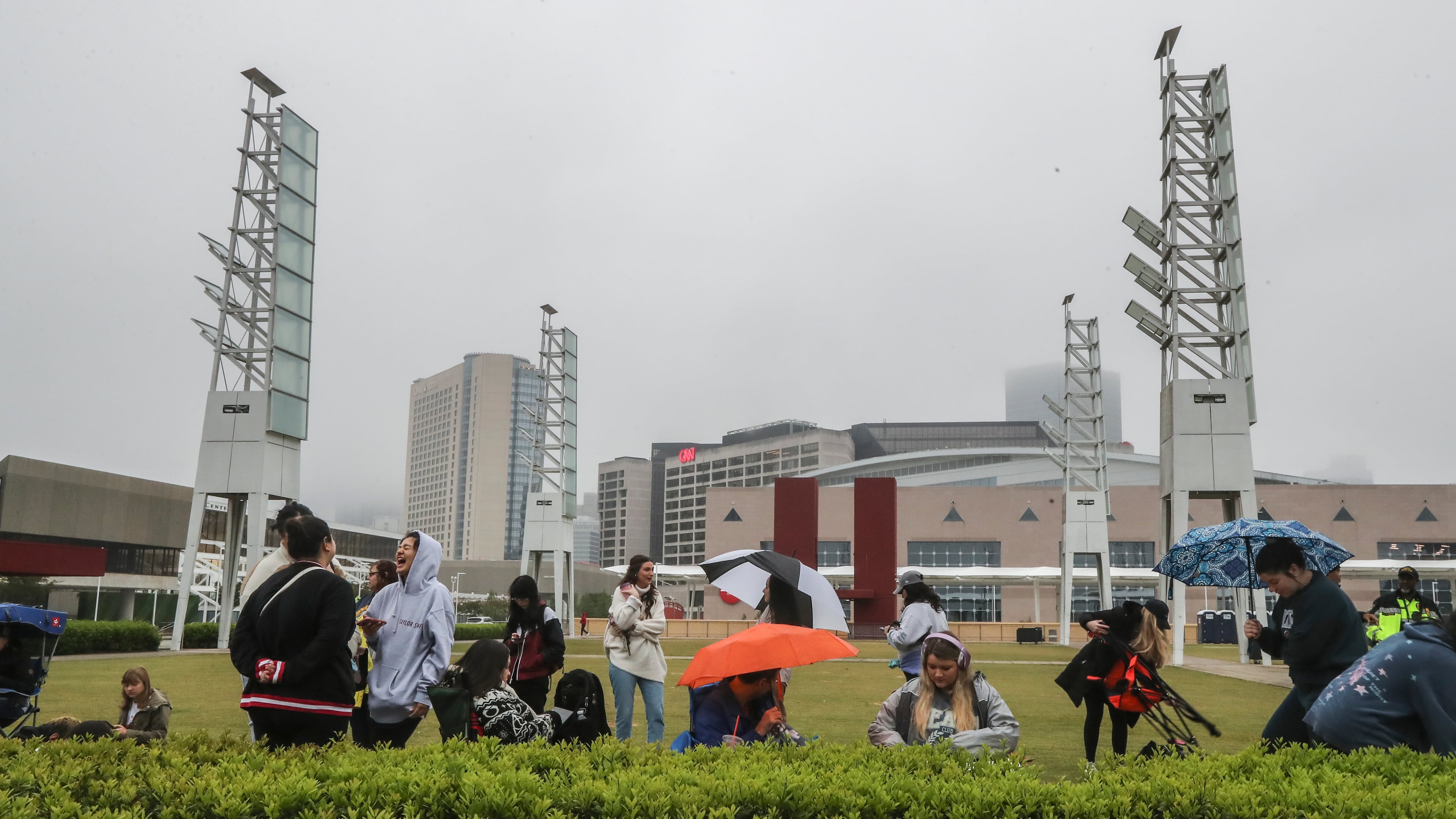 A development with a collection of restaurants and other tenants is envisioned in what is currently a grassy area with concrete walkways called International Plaza. (John Spink/AJC 2023)