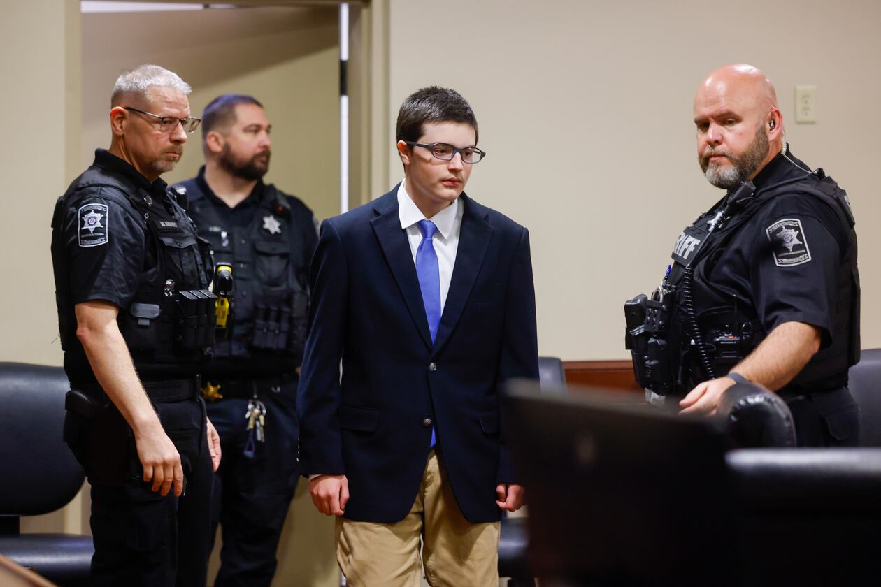 Colt Gray, the 16-year-old Apalachee High School shooting suspect, is led in by deputies for a plea hearing at Barrow County Superior Court in Winder, Ga., on Friday, July 24, 2026. (Arvin Temkar/Atlanta Journal-Constitution via AP)