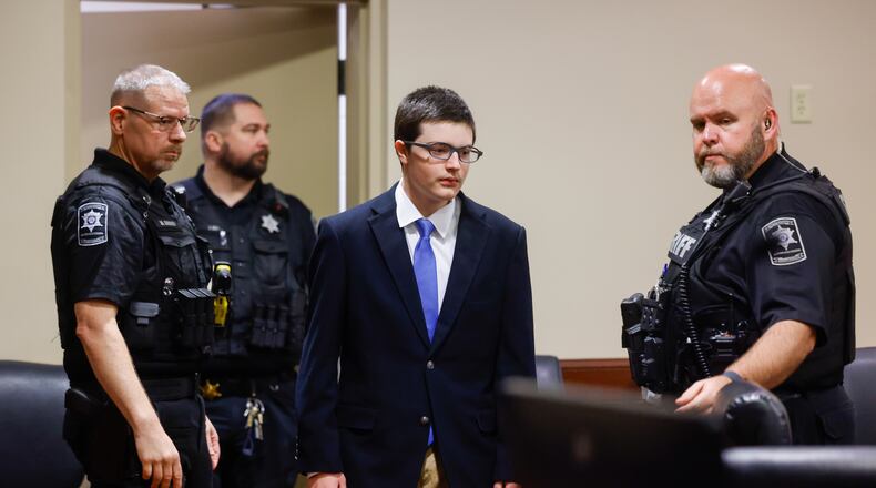 Colt Gray, the 16-year-old Apalachee High School shooting suspect, is led in by deputies for a plea hearing at Barrow County Superior Court in Winder, Ga., on Friday, July 24, 2026. (Arvin Temkar/Atlanta Journal-Constitution via AP)