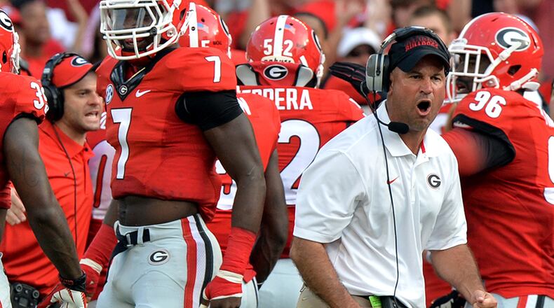 Jeremy Pruitt (right) in his first season as Georgia's defensive coordinator.