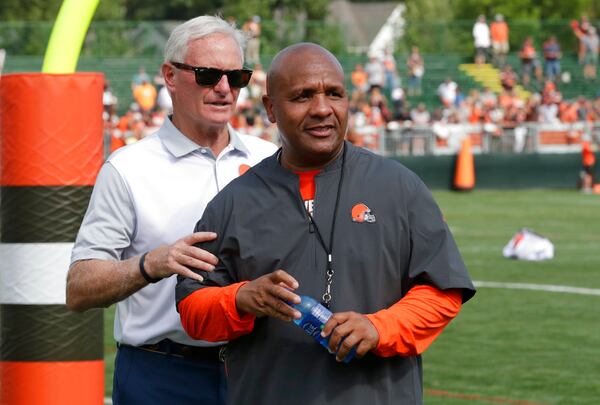In this July 30, 2018, file photo, Cleveland Browns owner Jimmy Haslam, left, and coach Hue Jackson watch the NFL football team's training camp in Berea, Ohio.  (AP Photo/Tony Dejak, File)