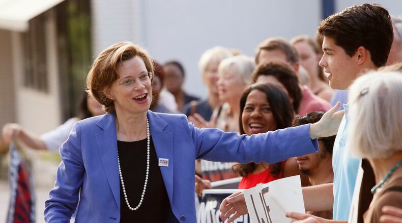July 23, 2014 - Atlanta - Nunn greets supporters who lined up outside the Silver Skillet for her arrival. Democrat Michelle Nunn kicked off the U.S. Senate general election Wednesday morning promising not to deviate from her message of “collaboration” and declining to take a direct shot at her newly crowned foe, Republican David Perdue. Nunn met with voters and volunteers at the Silver Skillet in Midtown Atlanta BOB ANDRES / BANDRES@AJC.COM