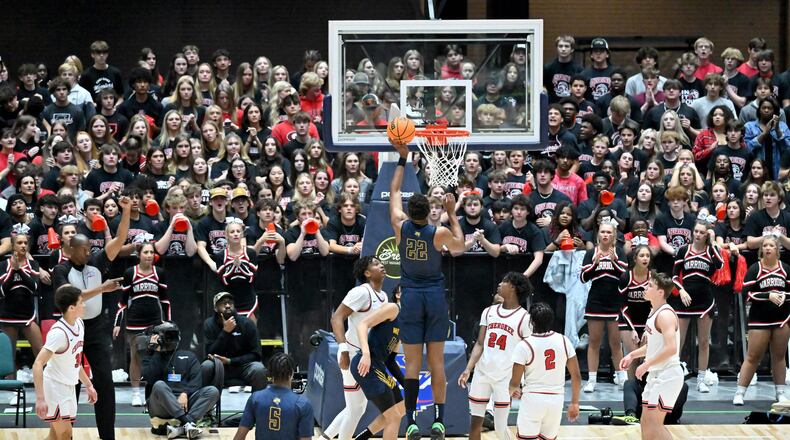 Wheeler's Arrinten Page (22) goes up for a shot during 2023 GHSA Basketball Class 7A Boy’s State Championship game at the Macon Centreplex, Saturday, March 11, 2023, in Macon, GA. (Hyosub Shin / Hyosub.Shin@ajc.com)