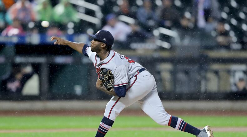 NEW YORK, NY - SEPTEMBER 25:  Touki Toussaint #62 of the Atlanta Braves delivers a pitch in the first inning against the New York Mets on September 25,2018 at Citi Field in the Flushing neighborhood of the Queens borough of New York City.  (Photo by Elsa/Getty Images)