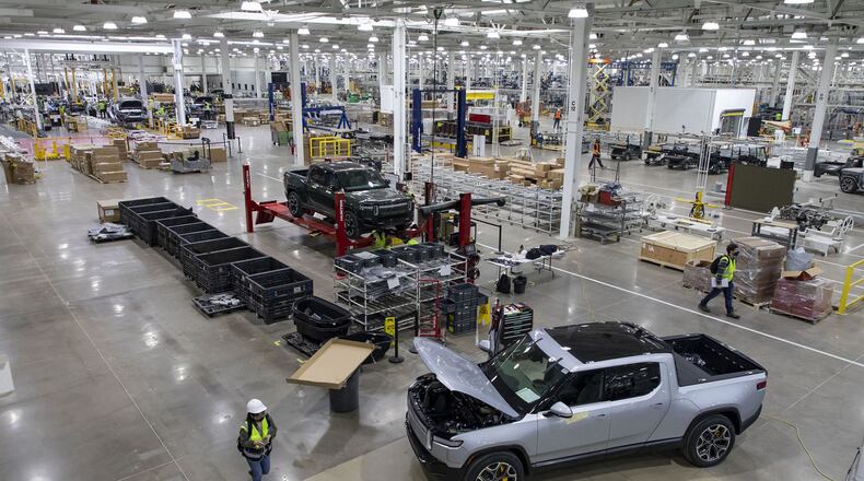 RT1 trucks are assembled and tested on April 14, 2021, before the new Rivian plant fully opens in Normal, Illinois. Rivian's proposed $5 billion plant in Georgia has made political waves. (Brian Cassella/Chicago Tribune/TNS)