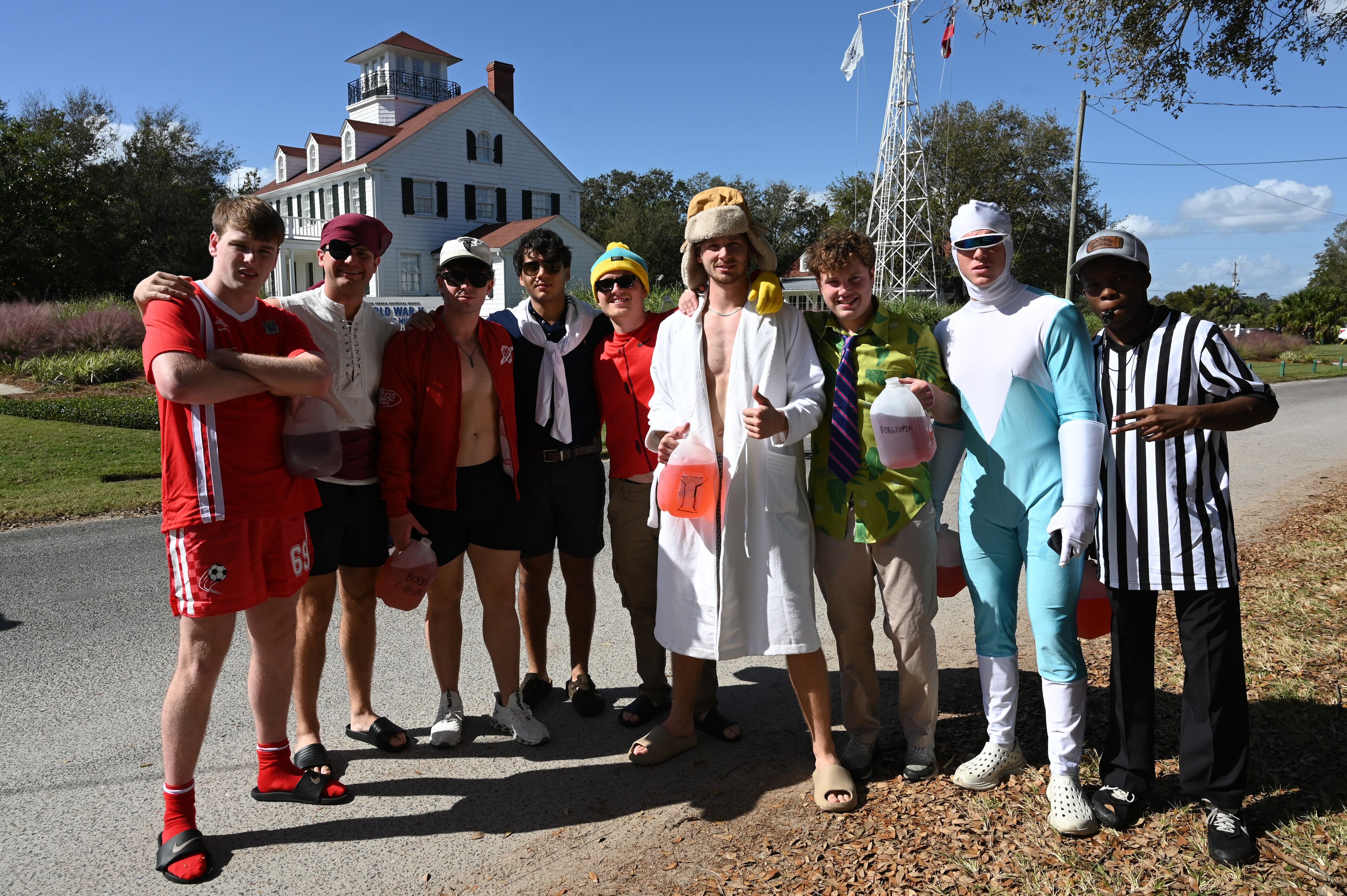 UGA students with Halloween costumes pose for a photo as they gather for the annual “Frat Beach” party to celebrate before the annual Georgia-Florida football game on St. Simons Island, Friday, November 1, 2024. On the weekend of the Georgia-Florida football game, St. Simons Island’s East Beach becomes “Frat Beach,” an open-air party teeming with thousands of college students. (Hyosub Shin / AJC)