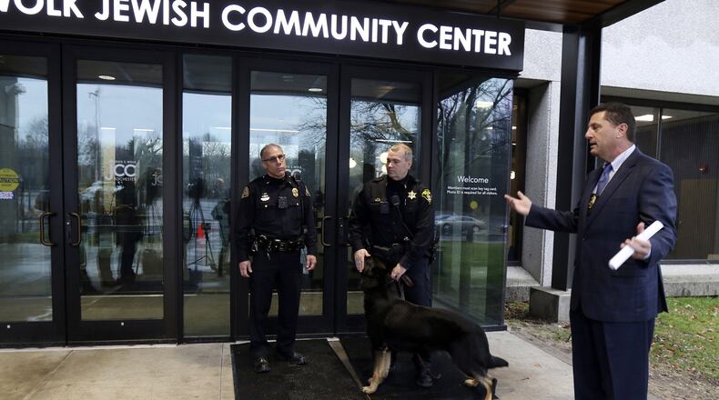 Brighton Police Chief Mark Henderson talks to reporters after a press briefing after a bomb threat was reported at the Louis S. Wolk Jewish Community Center of Greater Rochester in Brighton, N.Y., on March 7. Henderson said his department will work with the FBI to see if the threat was similar to those received at other JCC facilities across the U.S. Henderson said there was no bomb found at the center. TINA MACINTYRE-YEE / DEMOCRAT & CHRONICLE VIA AP