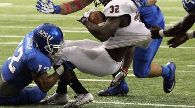 Georgia State’s defense stops Troys’ #32 Brandon Burks from a touchdown in first half action at the Georgia Dome in Atlanta on Saturday October 12th, 2013. PHIL SKINNER / PSKINNER@AJC.COM