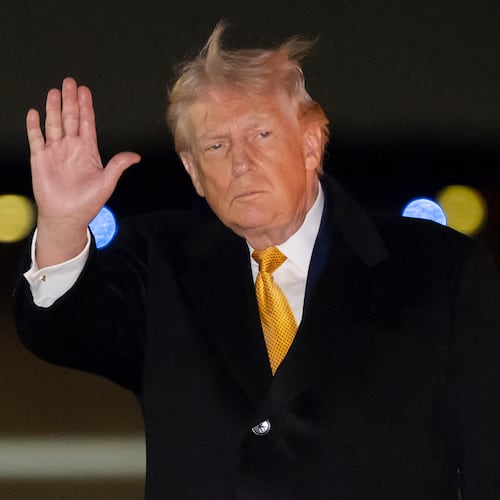 President Donald Trump waves as he arrives on Air Force One, Sunday, Jan. 4, 2026, at Joint Base Andrews, Md. (AP Photo/Alex Brandon)