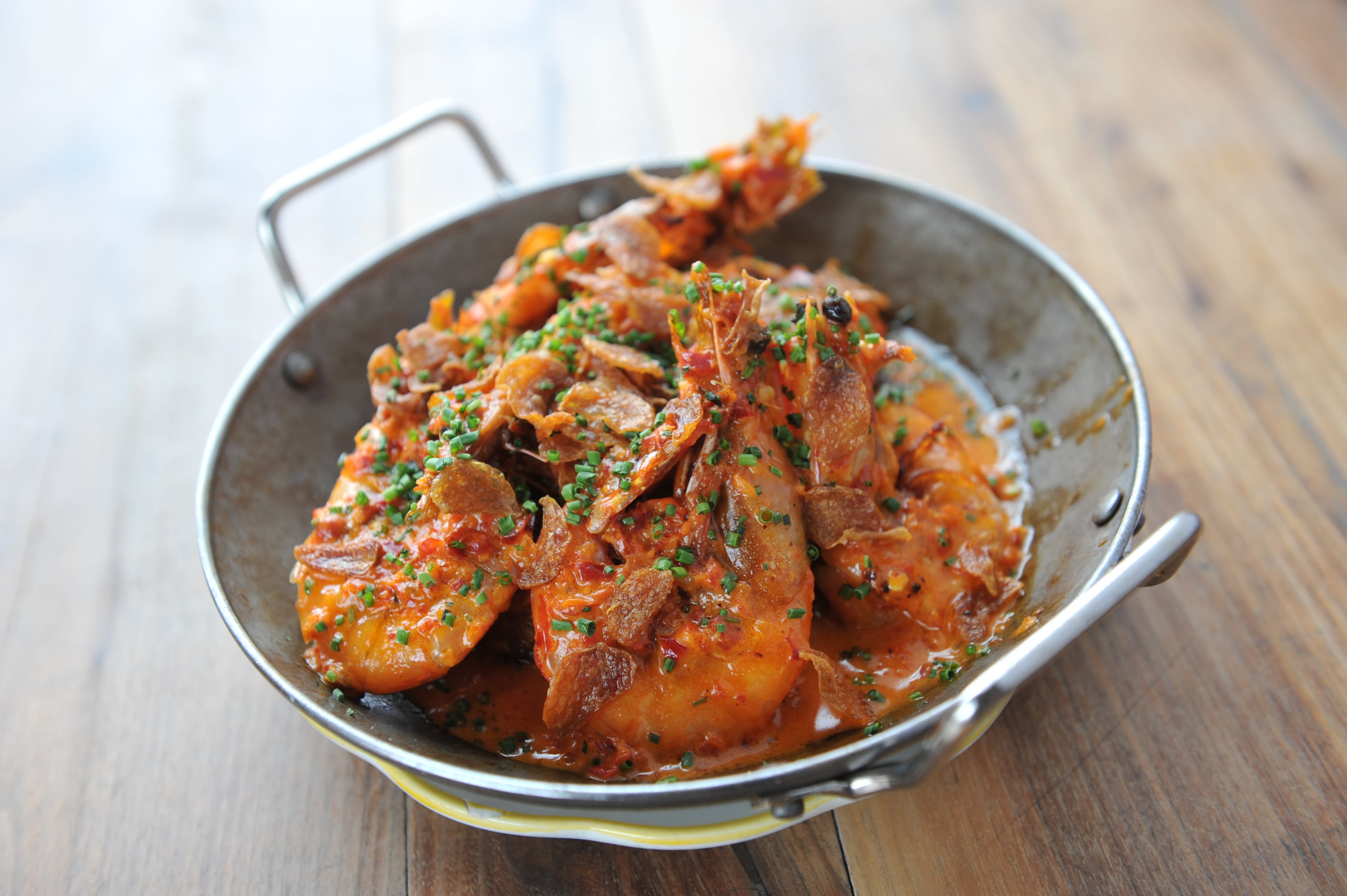 The Optimist's menu rightly calls this saucy heap “messy but worth it.” Fingers and forks work in tandem to deliver each meaty, buttery, spicy bite. (Becky Stein for the AJC)