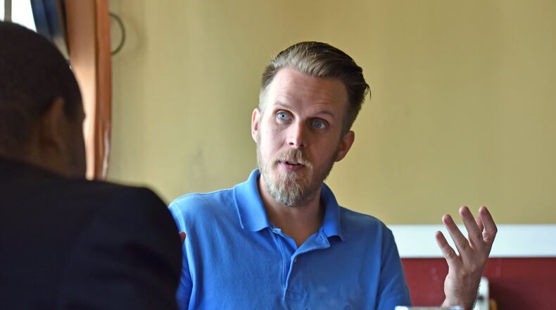 At the behest of Amina Osman, Clarkston Mayor Ted Terry hired some of the teens from Joint International Regimental Inc. to do small tasks for his 2017 re-election campaign. He paid them $15 an hour. HYOSUB SHIN / HSHIN@AJC.COM 2015