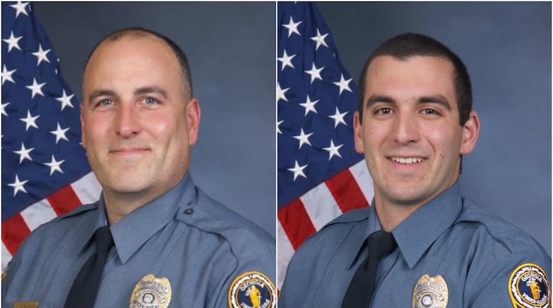 Former Gwinnett County police Sgt. Michael Bongiovanni (left) and Master Police Officer Robert McDonald. (Credit: Gwinnett County Police Department)