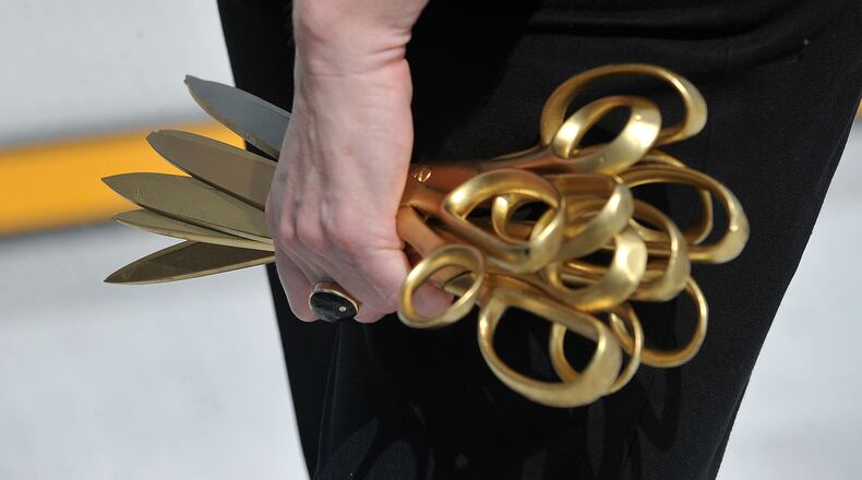 Overly large scissors like these are used in ribbon-cutting ceremonies as a classic symbol of the grand opening of a new business or the completion of a special project.