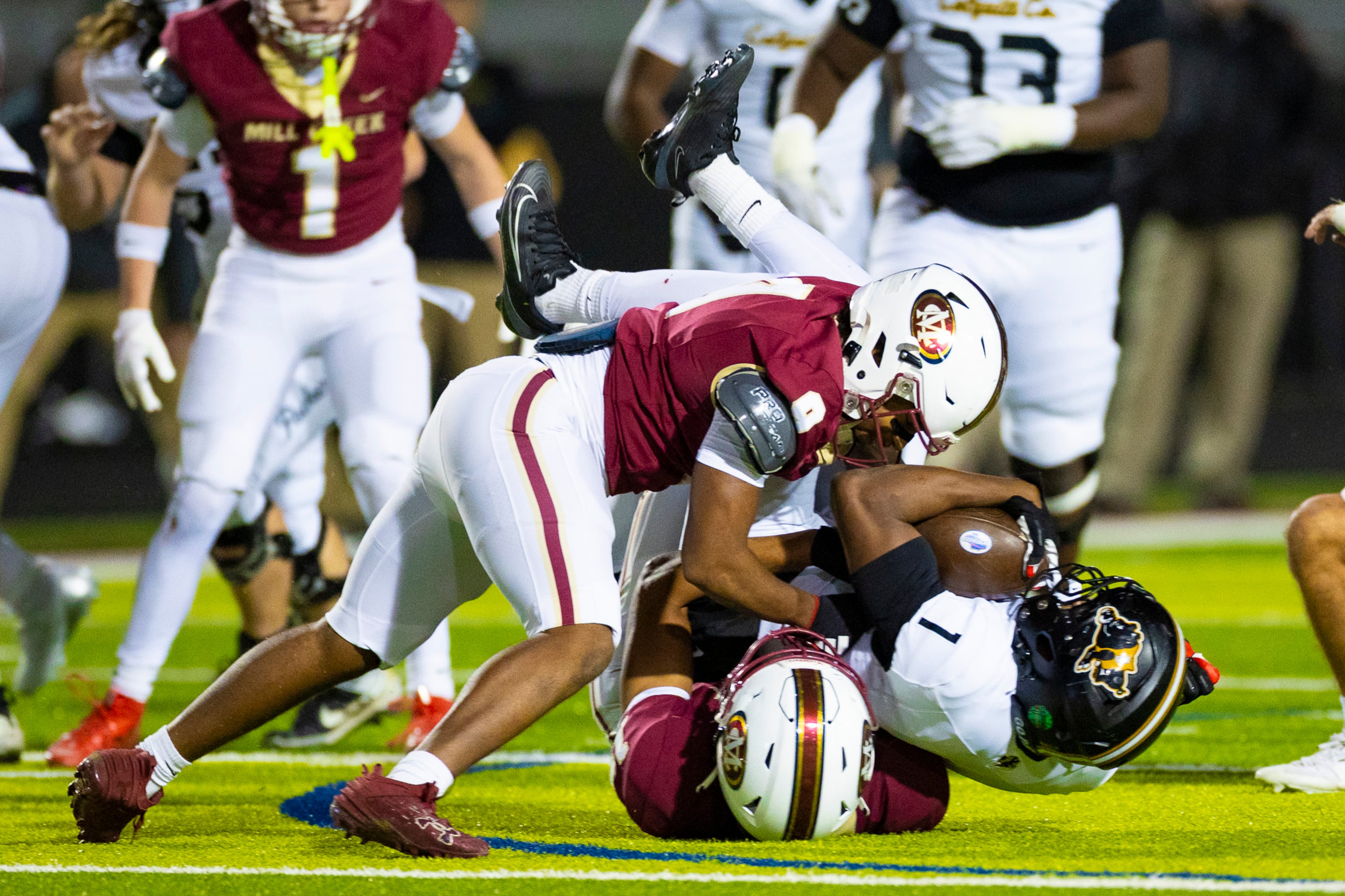 Colquitt running back and UGA commit Jae Lamar (1) gets tackled during the second half against Mill Creek at Mill Creek Community Stadium in Hoschton on Nov. 14th, 2025. (Oscar Guevara Saenz for the AJC)