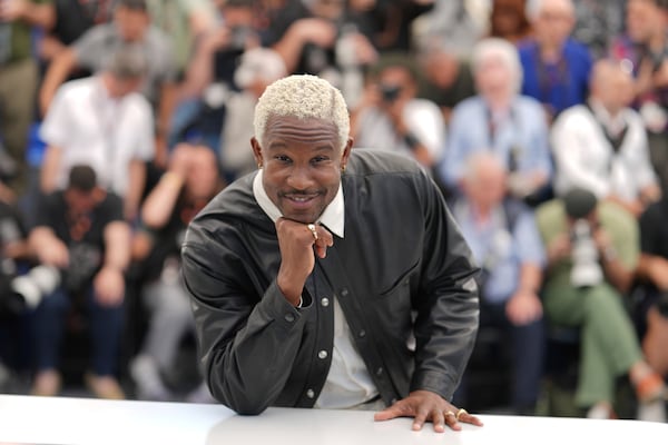 Director Akinola Davies poses for photographers at the photo call for the film 'My Father's Shadow' at the 78th international film festival, Cannes, southern France, Sunday, May 18, 2025. (AP Photo/Natacha Pisarenko)