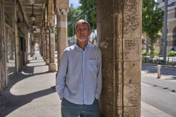 Guy Poran, a former pilot who is one of the initiators of a list of air force personnel calling for the army to focus on releasing the hostages, poses for a portrait in Tel Aviv, Wednesday, April 16, 2025. (AP Photo/Ohad Zwigenberg)