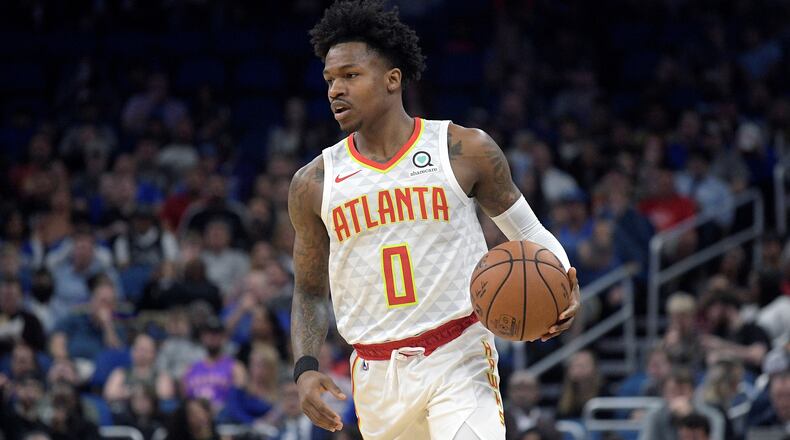 Atlanta Hawks guard Brandon Goodwin (0) brings the ball up the court during the first half of an NBA basketball game against the Orlando Magic Monday, Dec. 30, 2019, in Orlando, Fla. (AP Photo/Phelan M. Ebenhack)