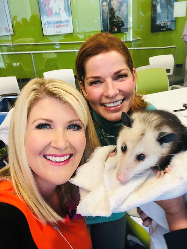 San Diego NBC 7 anchor and reporter Monica Dean with Dagmar Midcap and an opossum. Contributed by Monica Dean)
