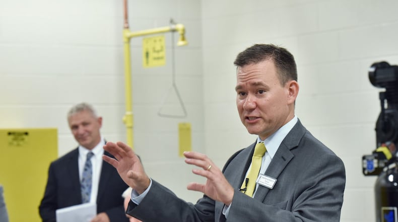 Principal Jonathon Wetherington speaks to guests during a tour in Engineering and Technology Lab at Paul Duke STEM High School. (File photo)