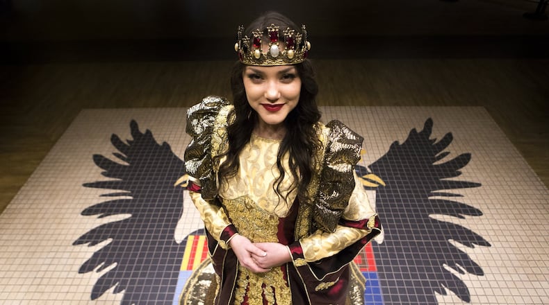 - Ashlyn Süpper, 20, who plays Queen Doña Maria Isabella, poses for a portrait in the lobby of Medieval Times Dinner & Tournament at Sugarloaf Mills in Lawrenceville. For the first time in its nearly 35 year history, the show is introducing a queen into its performance. Süpper has worked at the Lawrenceville Medieval Times for three years and is one of four queen actresses at the castle. (Casey Sykes for The Atlanta Journal-Constitution)
