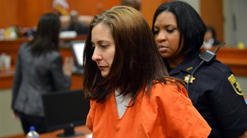 Andrea Sneiderman was initially implicated in the death of her husband, Rusty, outside a Dunwoody daycare in 2010. Her boss, Hemy Neuman, was convicted of murder, and at a subsequent trial she was convicted of lying during the investigation. She was released 10 months into a 5-year prison sentence.