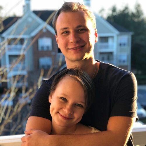 This photo provided by the family shows Robert Gilman and his sister, Lexie Hudson, in Lilburn, Ga., in 2019. (Gilman family via AP)