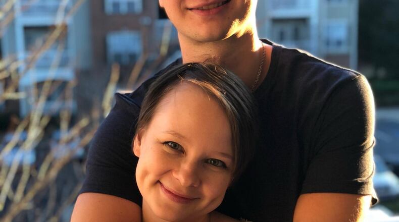 This photo provided by the family shows Robert Gilman and his sister, Lexie Hudson, in Lilburn, Ga., in 2019. (Gilman family via AP)
