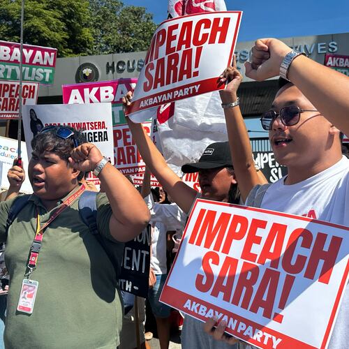 Protesters shout slogans during a rally calling for the impeachment of Philippine Vice President Sara Duterte outside the House of Representative in Quezon city, Philippines on Monday, May 11, 2026. (AP Photo/Joeal Calupitan)