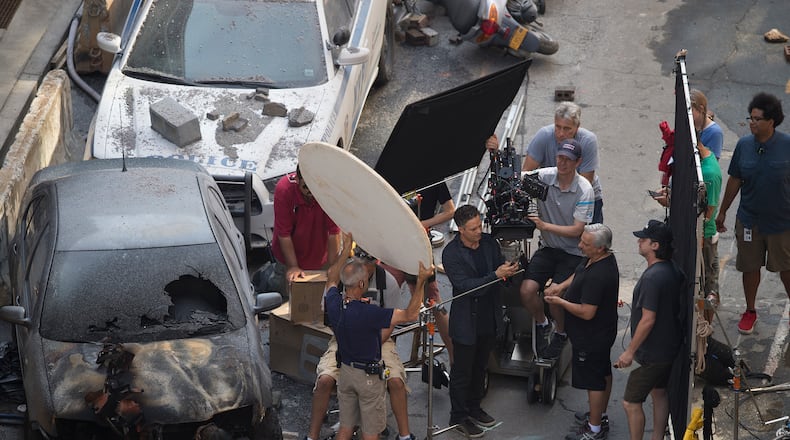 Cast member Mark Ruffalo works during the filming of "Avengers: Infinity War, Wednesday, July 5, 2017, in Atlanta. The set is modeled after a New York City street. The movie is slated to release in May 2018. (AP Photo/Mike Stewart)